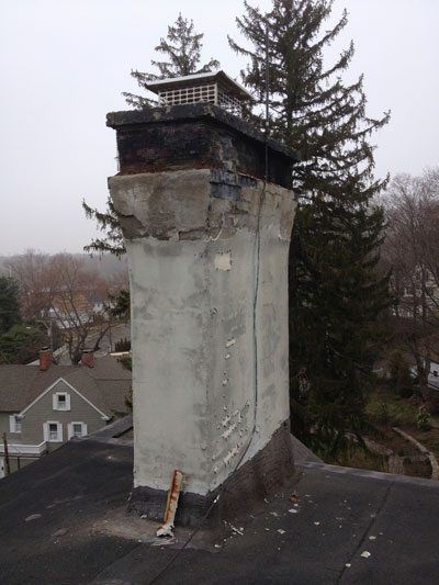 This stucco chimney needs maintenance This stucco chimney needs maintenance