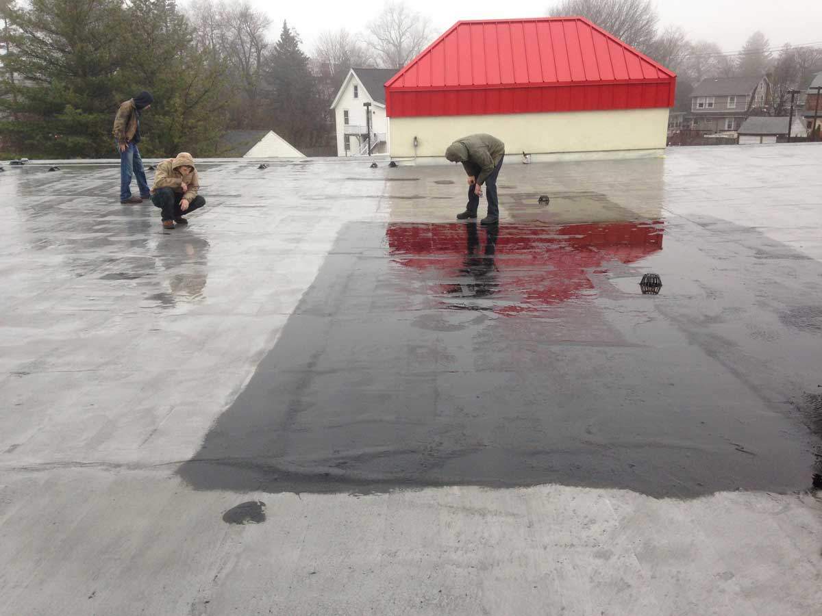 Build up roof in Stratford CT leaking - hard to find the leak Commercial roofs in Stratford CT leaking - hard to find the leak