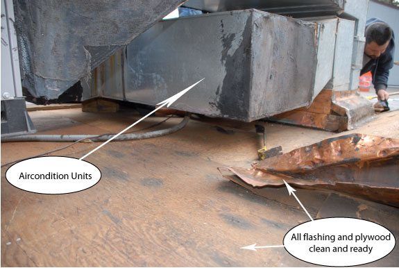 Step 9 - Copper flashing repaired and prepared for rubber roof - It is very important to remove all roofing debris and material; around flashing on a flat roof. Step 10 - Copper flashing repaired and prepared for rubber roof - It is very important to remove all roofing debris and material; around flashing on a flat roof.