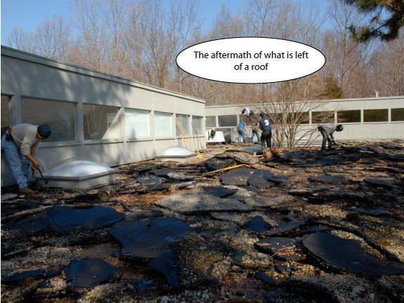 Step 2 - Breaking up the old roof. Commercial Flat roof repair - removing old roofing material takes a lot of effort. After lifting and breaking the old roofing up, it is thrown into a dumpster. Step 2 - Breaking up the old roof. Commercial Flat roof repair - removing old roofing material takes a lot of effort. After lifting and breaking the old roofing up, it is thrown into a dumpster.