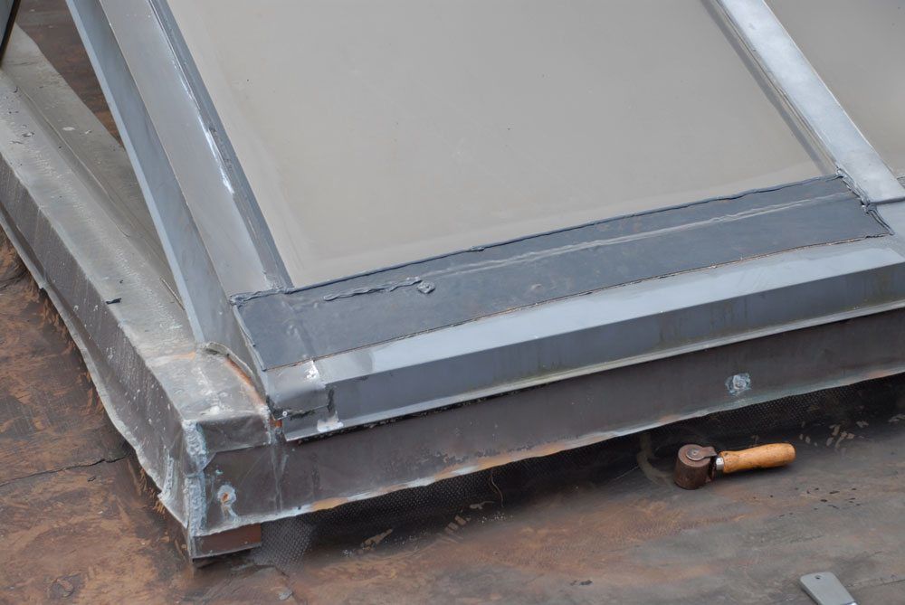 After repairing a skylight with cover tape After repairing a skylight with cover tape