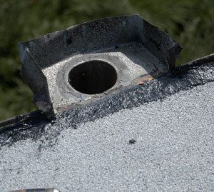 Some scuppers are tied into a down pipe like this one in the picture. Some scuppers are tied into a down pipe like this one in the picture.