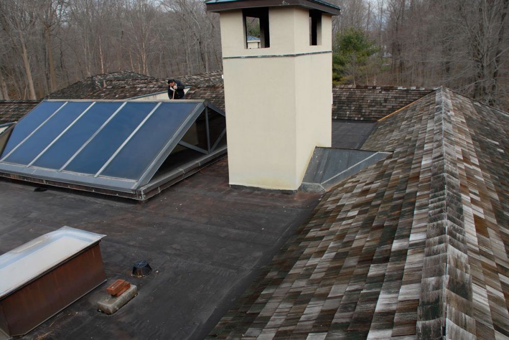 Small roof surface and many objects make it harder to install a flat roofs Small roof surface and many objects make it harder to install a flat roofs
