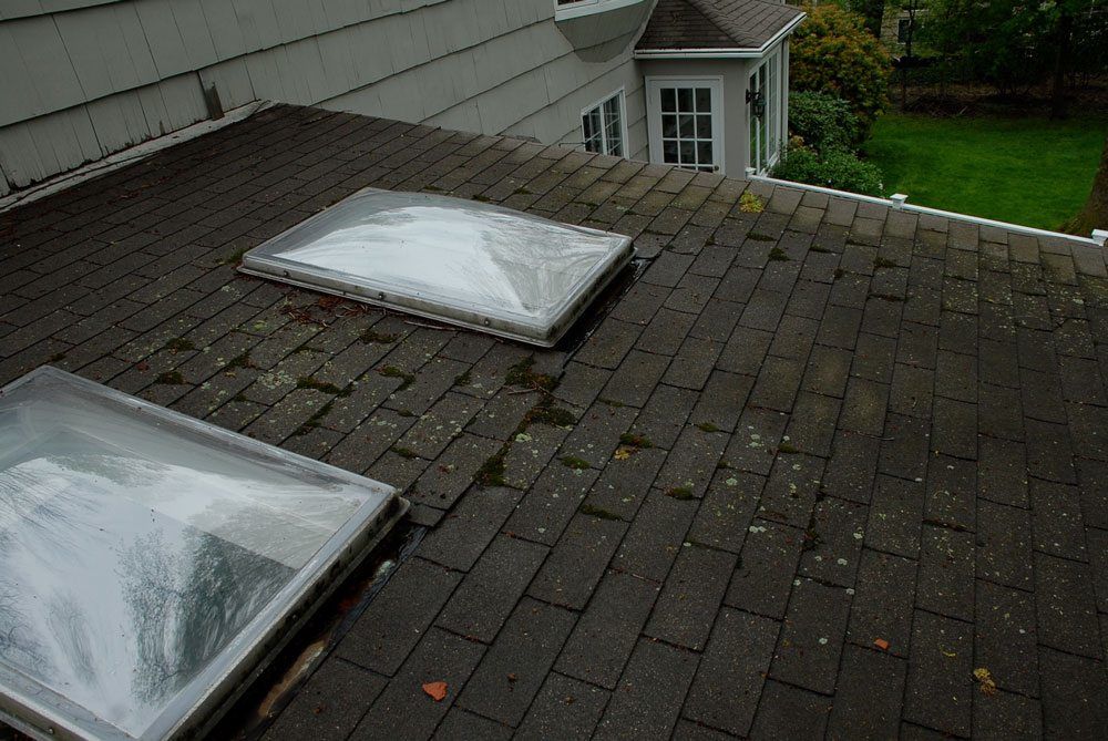 skylight on low pitch shingle roof causing leaks skylight on low pitch shingle roof causing leaks