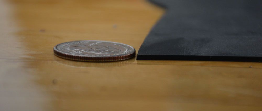 EPDM Rubber Roofing membrane the thickness of a quarter EPDM Rubber Roofing membrane the thickness of a quarter