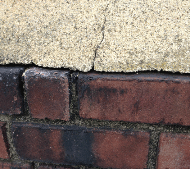 When the cement slab separates from the bricks, water then can get inside the chimney busting the bricks during freezing. When the cement slab separates from the bricks, water then can get inside the chimney busting the bricks during freezing.