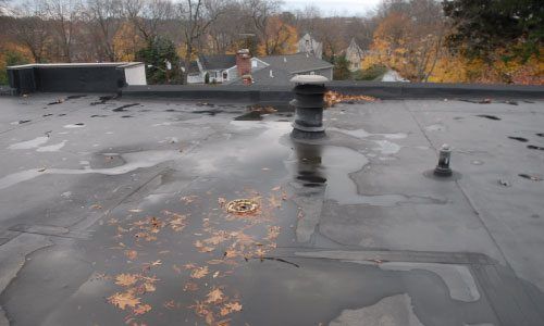 This is what a EPDM rubber roof looks like. It is smooth and have less seams. They often need repairs. New Canaan, Westport, Connecticut This is what a EPDM rubber roof looks like. It is smooth and have less seams. They often need repairs. New Canaan, Westport, Connecticut