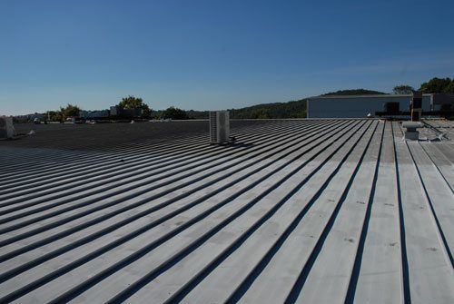 This metal roof was covered with a Modified Bitumen Membrane and the life is extended to another 40 years This metal roof was covered with a Modified Bitumen Membrane and the life is extended to another 40 years