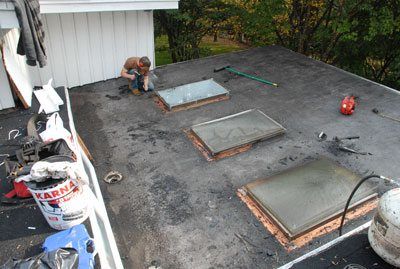 After cleaning he flashing on a skylight, it is time to install new flashing membrane over the copper flashing. After cleaning the flashing on a skylight, it is time to install new flashing membrane over the copper flashing.