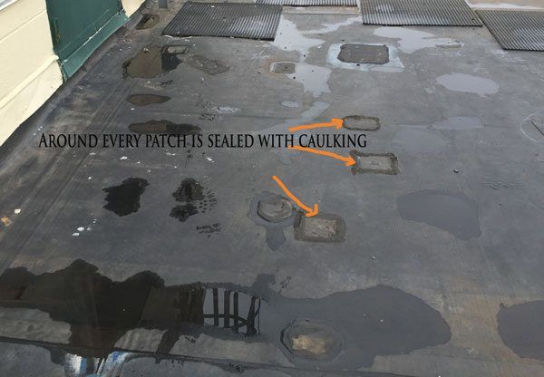 EPDM membrane Roof - Foot Traffic Repair Patches on an EPDM Roof - the mats are not in the walk areas. EPDM membrane Roof - Foot Traffic Repair Patches on an EPDM Roof - the mats are not in the walk areas.