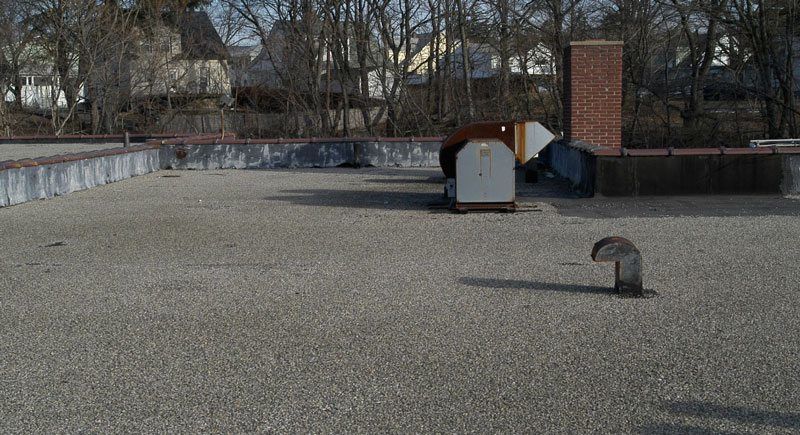 This is a BUR system also known as a Tar and Gravel roof. Commercial Flat Roof - This is a BUR system also known as a Tar and Gravel roof.