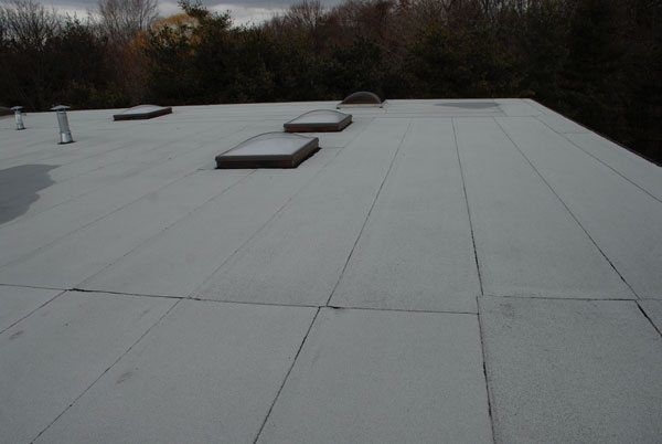 This image shows a 2 ply Modified Bitumen torch down roofing system. This image shows a 2 ply Modified Bitumen torch down roofing system.