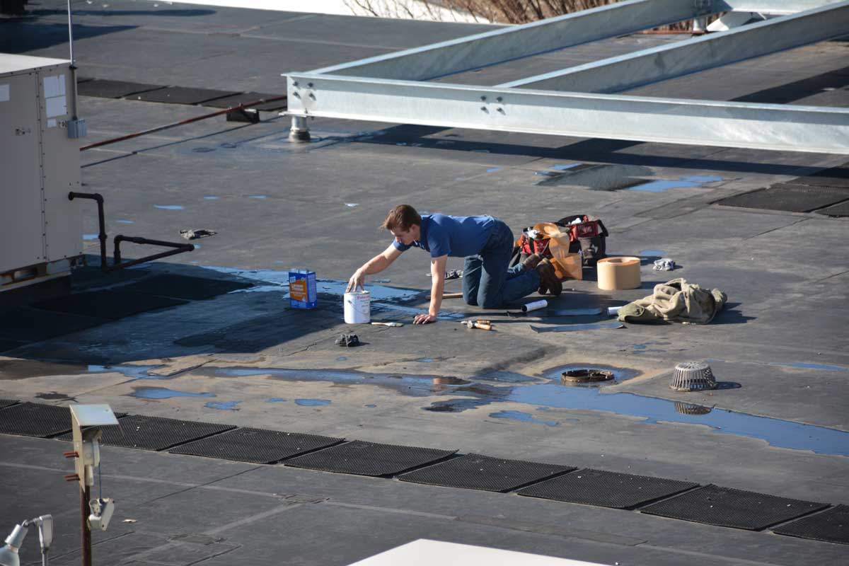 EPDM Rubber Roofs are patched constantly Rubber Membrane Roof being patched
